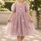 floral flower girl dress in embroidered floral ivory tulle and big puffy sleeves.  