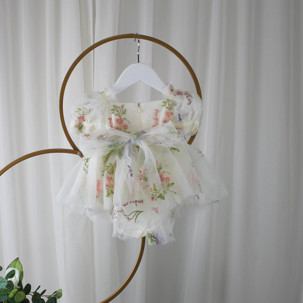 Fairy First birthday baby girls romper dress in ivory floral with wings. 