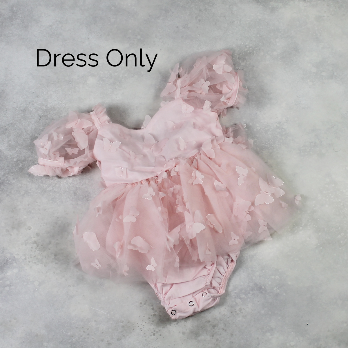 Light pink butterfly dress only, baby romper style, laid flat