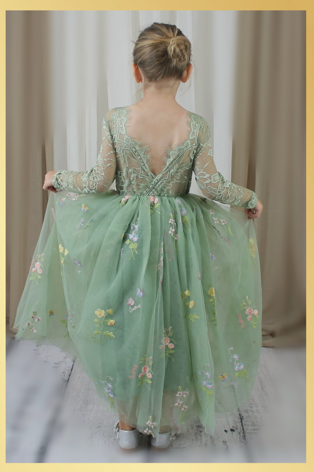 Sage floral flower girl dress in embroidered tulle. featuring long lace sleeves and full length floral tulle dress. 