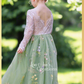 flower girl dress in sage green floral embroidered tulle with white lace long sleeves and full tulle style dress. 