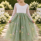 flower girl dress in sage green floral embroidered tulle with white lace long sleeves and full tulle style dress. 